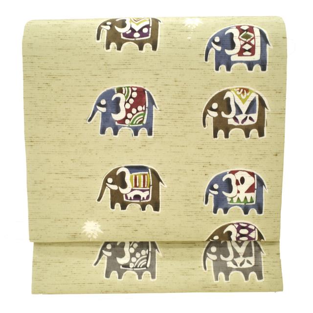 名古屋帯 九寸 正絹 未使用 東京染 紅型染 木蘭色 ぜんまい紬 象 ヤシ